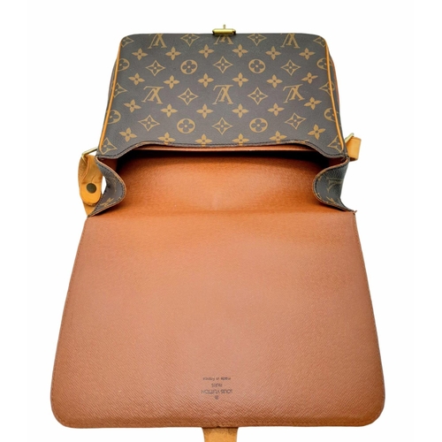 432 - A Vintage Louis Vuitton Cartouchiere Shoulder Bag. LV monogram canvas exterior with cow-hide leather... 