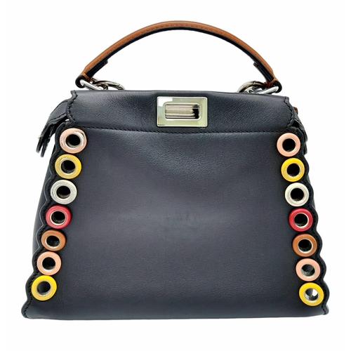 81 - A Fendi Nappa scalloped grommet mini peakaboo satchel bag in black and multicolour. Black leather ex... 