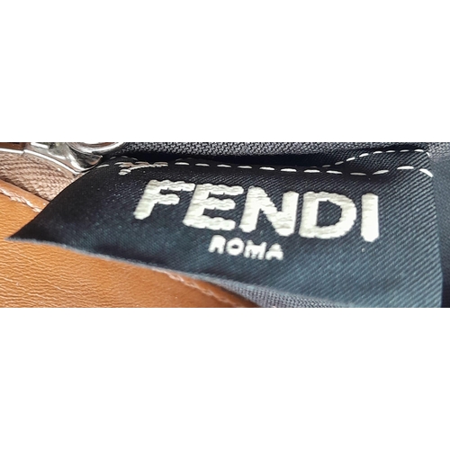 81 - A Fendi Nappa scalloped grommet mini peakaboo satchel bag in black and multicolour. Black leather ex... 