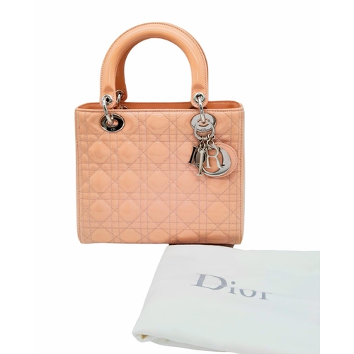 88 - A pink Christian Dior Cannage quilted patent leather Lady Dior Bag. Removable shoulder strap, silver... 