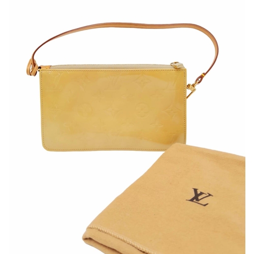 93 - A Louis Vuitton lime yellow Lexington pouch bag, patent leather exterior, beige interior, gold tone ... 