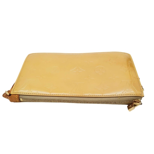 93 - A Louis Vuitton lime yellow Lexington pouch bag, patent leather exterior, beige interior, gold tone ... 