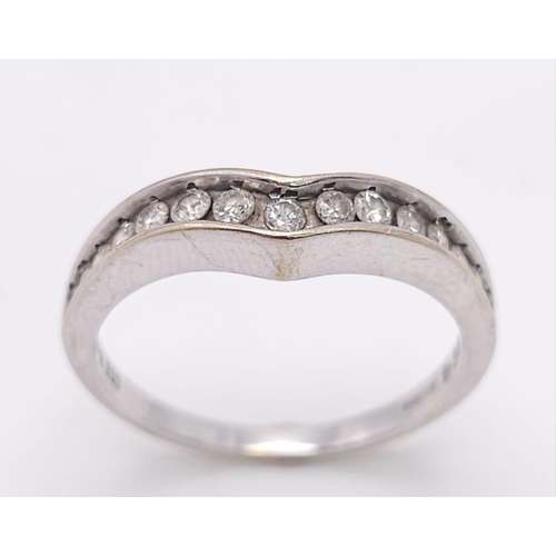 187 - An 18K White Gold Diamond Chevron Ring. 0.35ctw. Size O. 3.4g total weight.