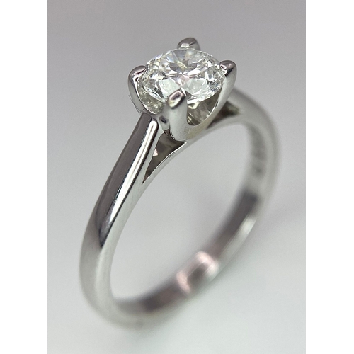 197 - An 18K White Gold Diamond Solitaire Ring. A 0.58ct brilliant round cut diamond. Size K. 3.15g total ... 