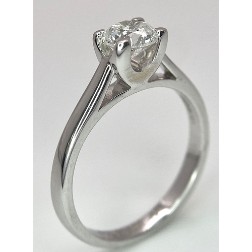 197 - An 18K White Gold Diamond Solitaire Ring. A 0.58ct brilliant round cut diamond. Size K. 3.15g total ... 