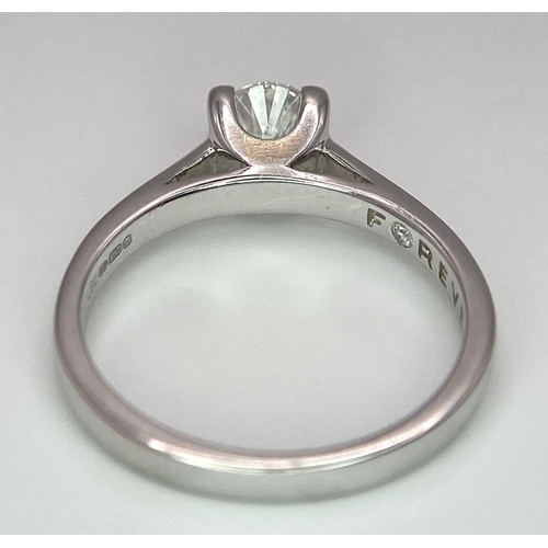 197 - An 18K White Gold Diamond Solitaire Ring. A 0.58ct brilliant round cut diamond. Size K. 3.15g total ... 