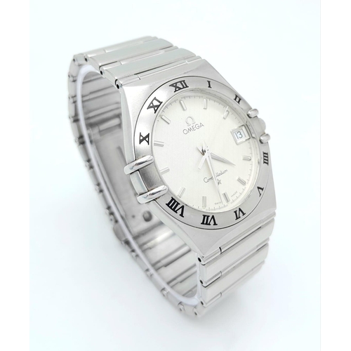 239 - An Omega Quartz Mid-Size Unisex Watch. Stainless steel bracelet and case - 34mm. White dial with dat... 