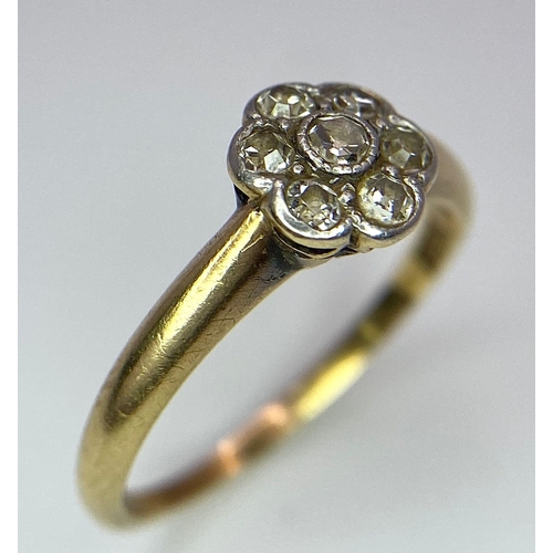 320 - An 18K Yellow Gold Diamond Cluster Floral Ring. Size L. 2.5g total weight.