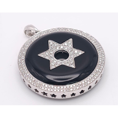 347 - An 18K White Gold Black Onyx and Encrusted Diamond Star Pendant. Rich black onyx with two different ... 