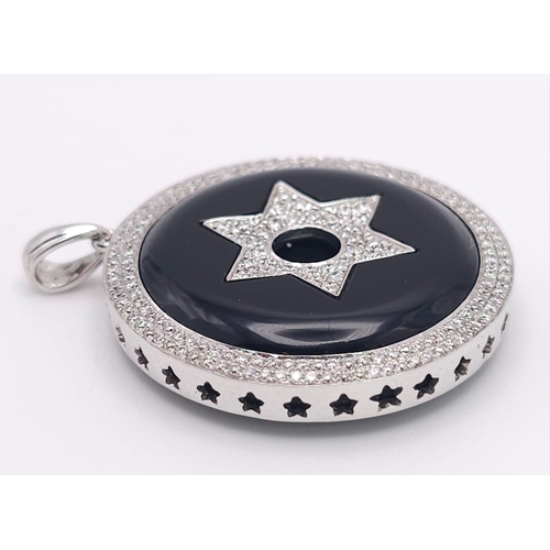 347 - An 18K White Gold Black Onyx and Encrusted Diamond Star Pendant. Rich black onyx with two different ... 