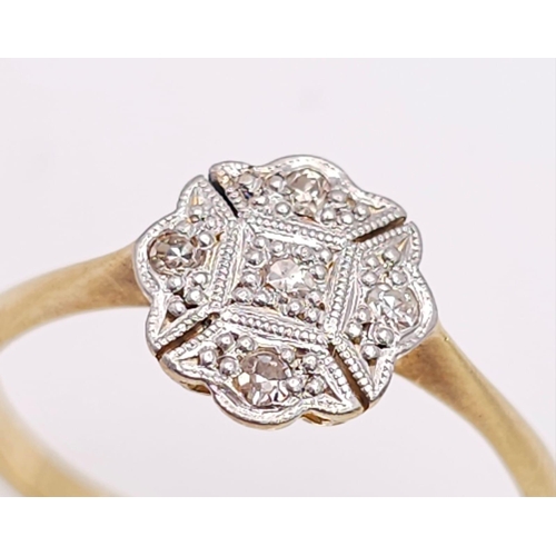 358 - A vintage, 18 K yellow gold ring with a cluster of diamonds, size: N, weight: 2 g.