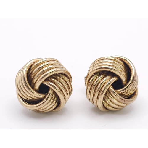 543 - A Pair of 9k Yellow Gold Knot Stud Earrings. 3.8g total weight. Ref: 16469