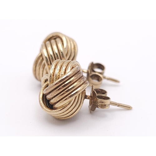 543 - A Pair of 9k Yellow Gold Knot Stud Earrings. 3.8g total weight. Ref: 16469