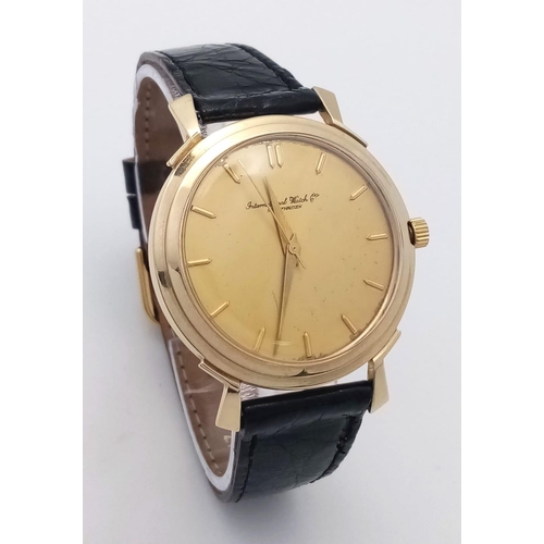 211 - A Vintage 14k Gold Cased International Watch Company Automatic Gents Watch. Black crocodile strap. 1... 