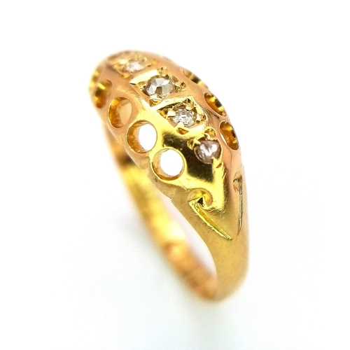 457 - An antique 18 K yellow gold ring with diamonds on a pierced design, hallmarked Birmingham 1906, size... 