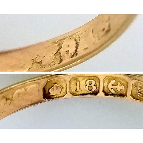 457 - An antique 18 K yellow gold ring with diamonds on a pierced design, hallmarked Birmingham 1906, size... 