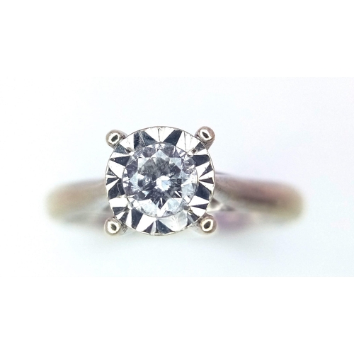 487 - A 9K White Gold Diamond Solitaire Ring. 0.25ct brilliant round cut diamond. Size K. 2.93g total weig... 