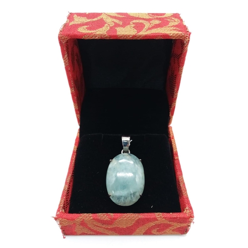 507 - A 24ct Aquamarine Cabochon Pendant set in 925 Sterling silver. W-8g. 4cm. Comes with a presentation ... 