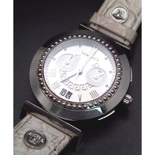 515 - A Designer Versace Quartz Ladies Watch. Cream leather strap. Stainless steel case - 41mm. Silver ton... 