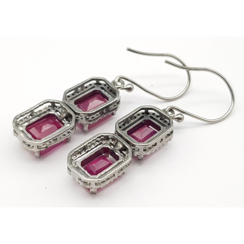 368 - A Pair of Madagascan Ruby & Diamond Earrings set in 925 Sterling silver. 13.10ctw - rubies. Diamond-... 