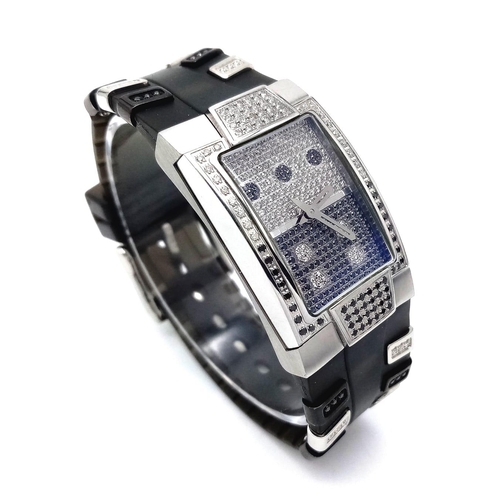 424 - A TechnoMarine 1.25ctw White and Black Diamond Ladies Quartz Watch. Resin and diamond strap. Case - ... 