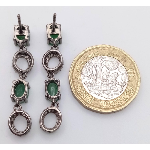 521 - A Pair of Zambian Emerald & Diamond Silver Drop Earrings. Emerald -2.68ctw. Diamond- 0.60ctw. 4cm dr... 