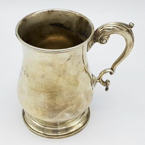 72 - A Sterling Silver Tankard Given to the Thrusters! Hourglass design with an ornate handle. Hallmarks ... 