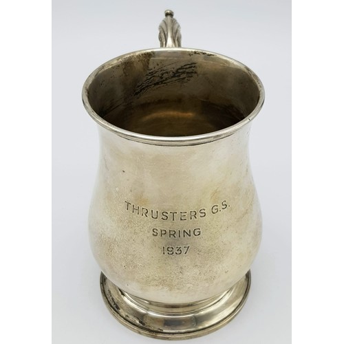 72 - A Sterling Silver Tankard Given to the Thrusters! Hourglass design with an ornate handle. Hallmarks ... 