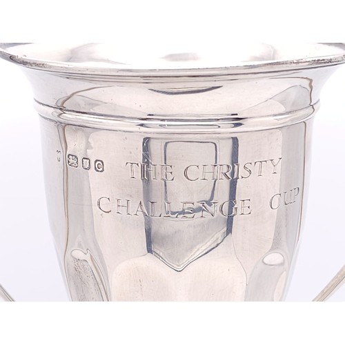 86 - A Sterling Silver Two Handled Trophy Cup - Given to the yearly winner of The Christy Cup Challenge w... 