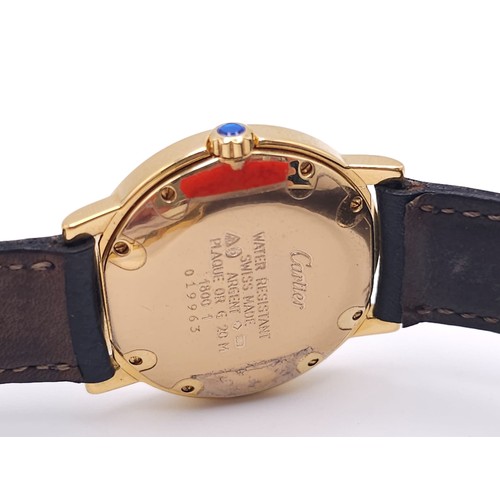 410 - A Must De Cartier Gold Plated Silver Quartz Ladies Watch. Black leather strap. Gold plated silver ca... 