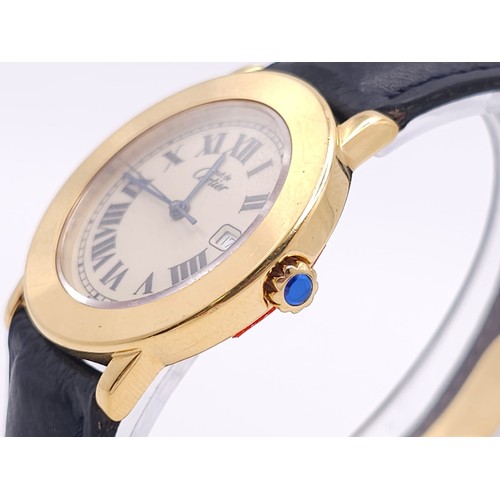 410 - A Must De Cartier Gold Plated Silver Quartz Ladies Watch. Black leather strap. Gold plated silver ca... 