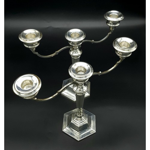 23 - A PAIR OF SILVER CANDELABRA EACH HOLDING 3 CANDLES IN CLASSIC STYLE AND HALLMARKED IN BIRMINGHAM 196... 