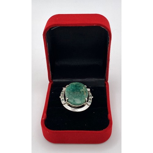 230 - A 45ct Oval Cut Brazilian Emerald 925 Silver Ring. W-13g. Size N. Comes with a presentation case. Re... 