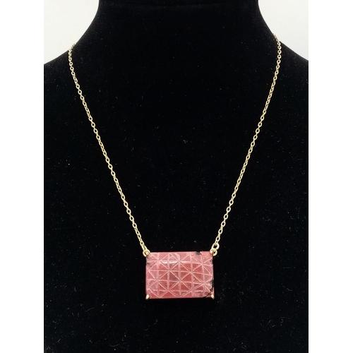 223 - A Carved African Ruby Pendant on a Gold Plated 925 Silver Necklace. Rectangular step cut. 52.20ct W-... 