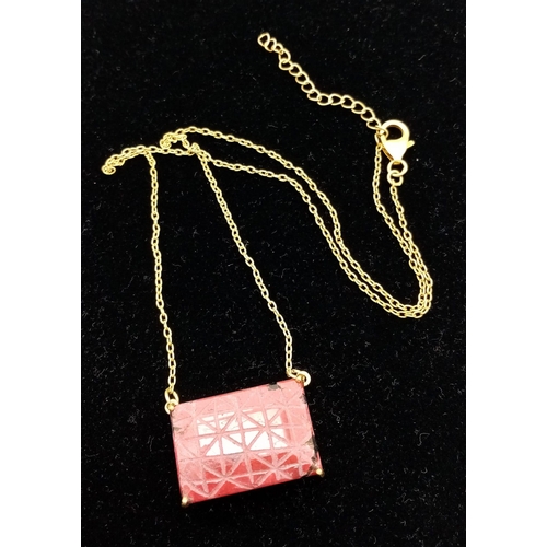 223 - A Carved African Ruby Pendant on a Gold Plated 925 Silver Necklace. Rectangular step cut. 52.20ct W-... 