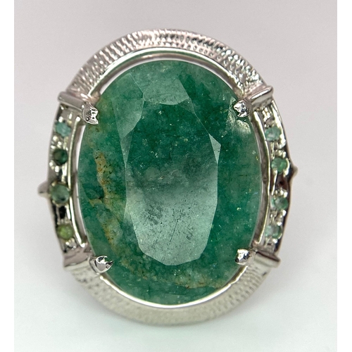 230 - A 45ct Oval Cut Brazilian Emerald 925 Silver Ring. W-13g. Size N. Comes with a presentation case. Re... 