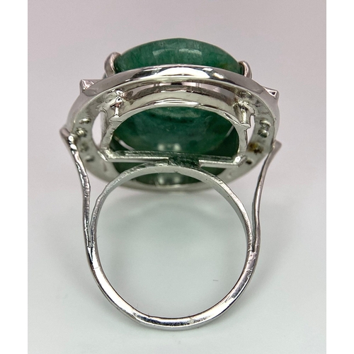 230 - A 45ct Oval Cut Brazilian Emerald 925 Silver Ring. W-13g. Size N. Comes with a presentation case. Re... 