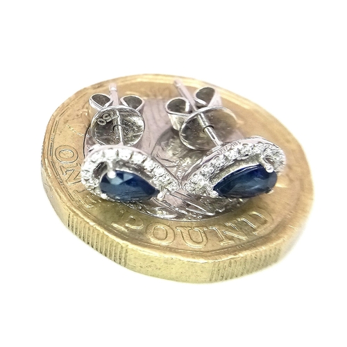 299 - A Pair of 18K White Gold, Diamond and Sapphire Cluster Rings - In a Pear Shape. 1.7g total weight.