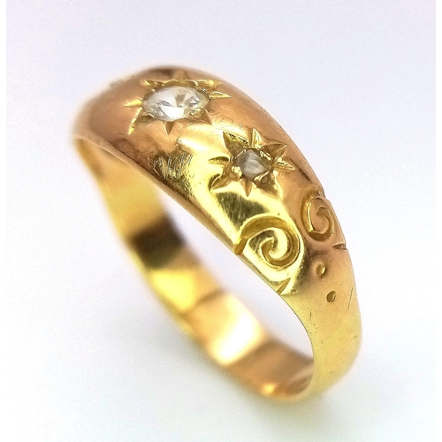 558 - A 9 K yellow gold ring with a trilogy of cubic zirconia. Size: m, weight: 2.3 g.