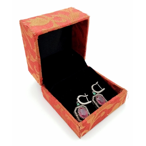 607 - A Pair of Madagascan Ruby and Diamond Earrings with Zambian Emeralds set in 925 Sterling silver. 7.2... 