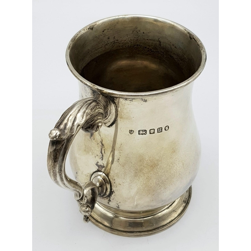 72 - A Sterling Silver Tankard Given to the Thrusters! Hourglass design with an ornate handle. Hallmarks ... 