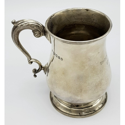 72 - A Sterling Silver Tankard Given to the Thrusters! Hourglass design with an ornate handle. Hallmarks ... 