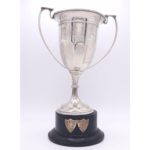 86 - A Sterling Silver Two Handled Trophy Cup - Given to the yearly winner of The Christy Cup Challenge w... 