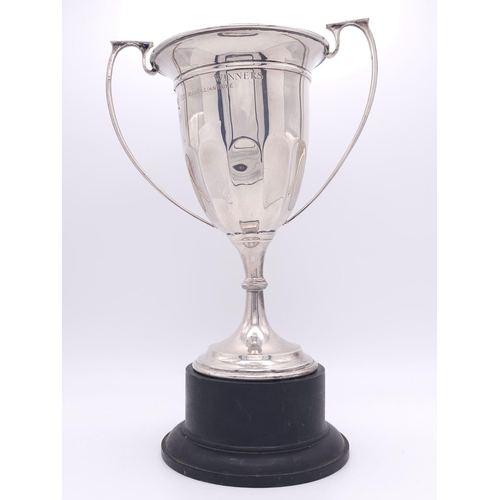 86 - A Sterling Silver Two Handled Trophy Cup - Given to the yearly winner of The Christy Cup Challenge w... 