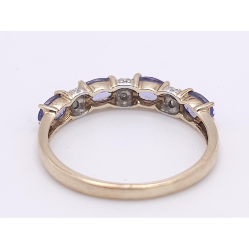 908 - A PRETTY 9K YELLOW GOLD DIAMOND & IOLITE  RING, WEIGHT 1.7G SIZE P