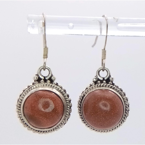 600 - A Pair of Sunstone Earrings Set in 925 Sterling silver. 14ct. W-7g. Comes with a presentation case. ... 