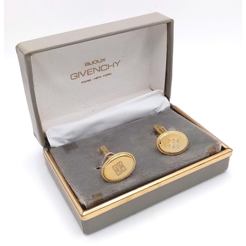 916 - An Excellent Condition Pair of Vintage Givenchy Gold Tone Cufflinks in Original Box. Lever Action, 2... 