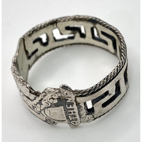 958 - An interesting sterling silver ring, designed by Adam Athena, converted from an old spoon handle. Si... 