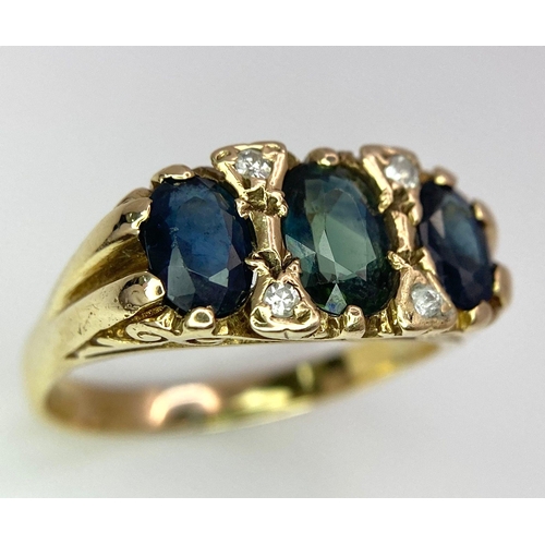 554 - An 18 K yellow gold ring with three oval cut blue/green sapphires and diamonds in between. Size: P, ... 