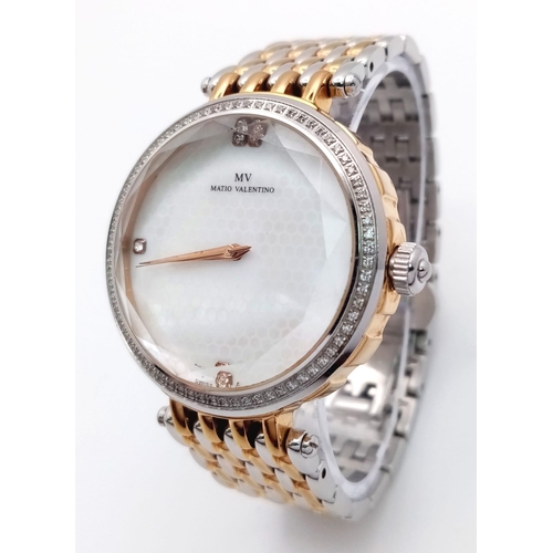 562 - A Matio Valentino Stylish Quartz Ladies Watch. Two tone bracelet and case - 37mm. Mother of pearl di... 